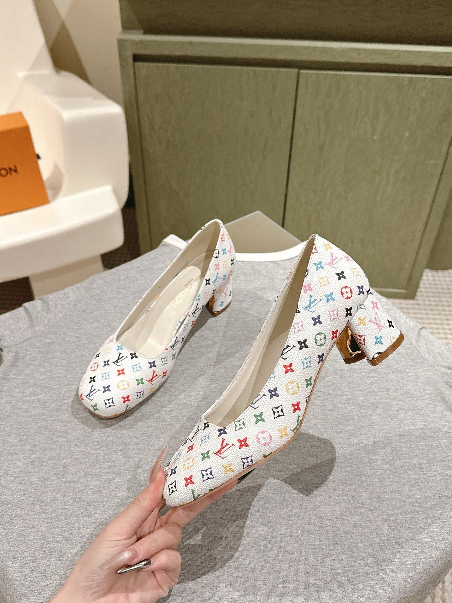 LOUIS VUITTON SWING HIGH PUMP 55 MM IN WHITE MONOGRAM CALFSKIN