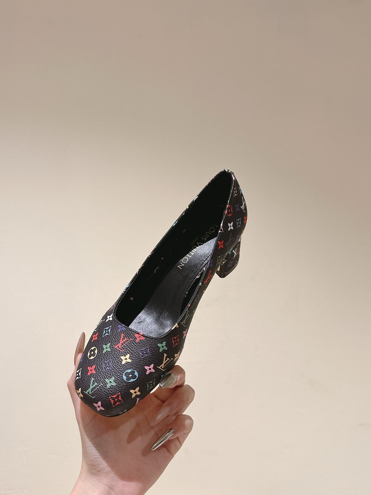 LOUIS VUITTON SWING HIGH PUMP 55 MM IN BLACK MONOGRAM CALFSKIN
