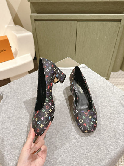 LOUIS VUITTON SWING HIGH PUMP 55 MM IN BLACK MONOGRAM CALFSKIN