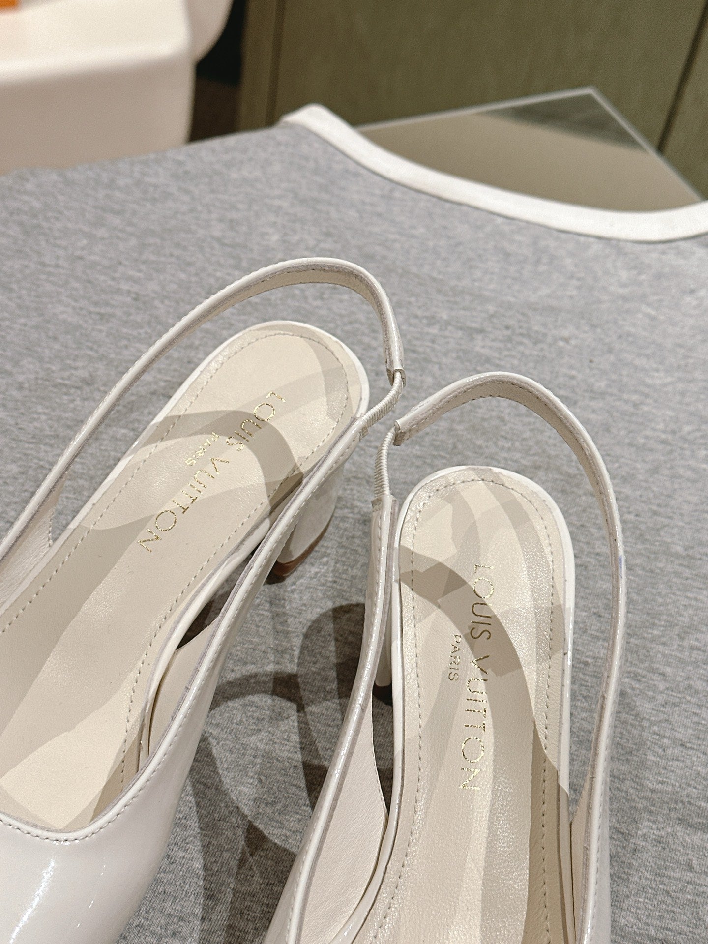 LOUIS VUITTON SWING SLINGBACK PUMP 55 MM IN WHITE PATENT CALFSKIN