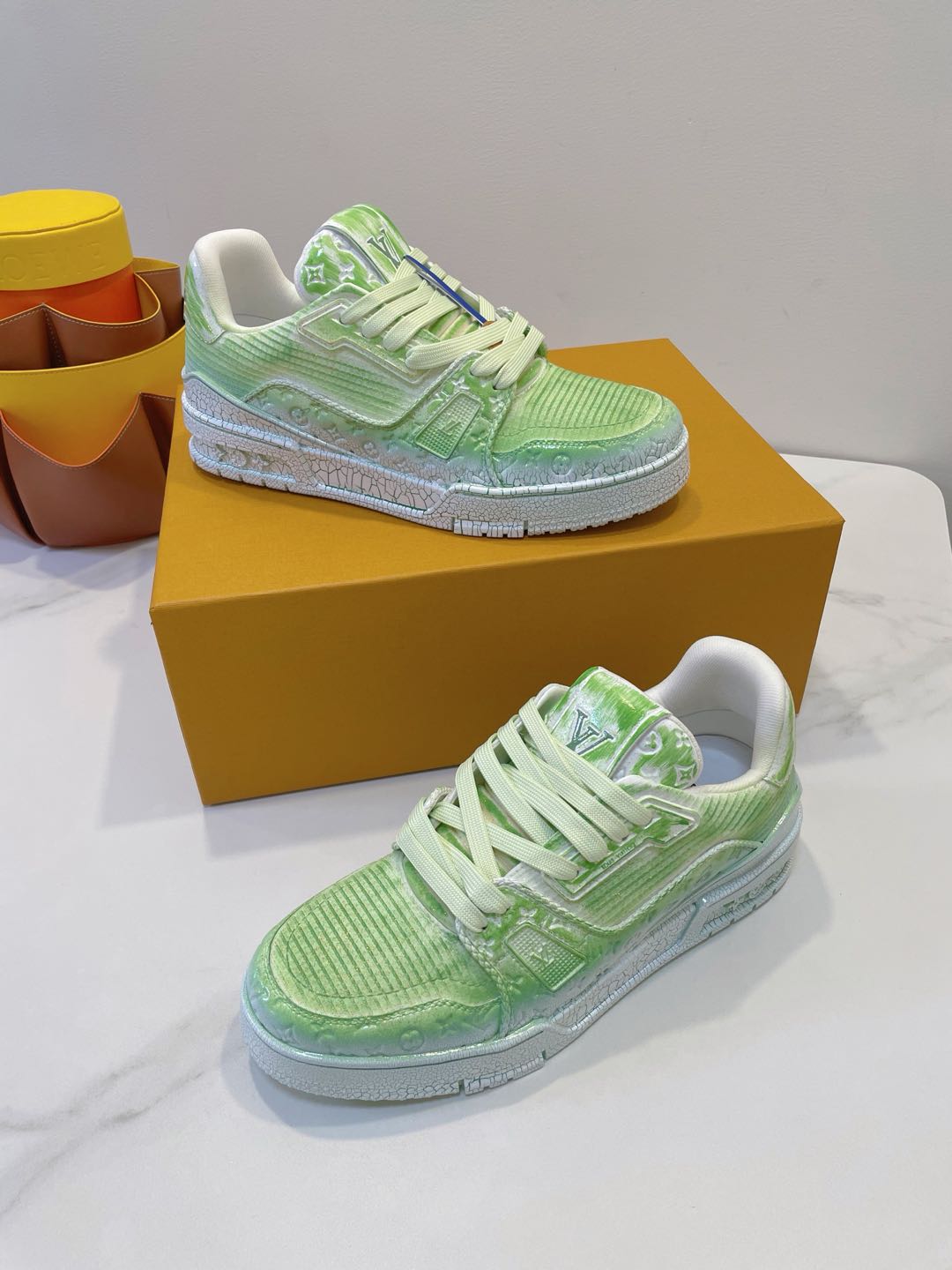 LOUIS VUITTON LV TRAINER MAXI SNEAKER IN GREEN PASTEL EMBOSSED CALFSKIN