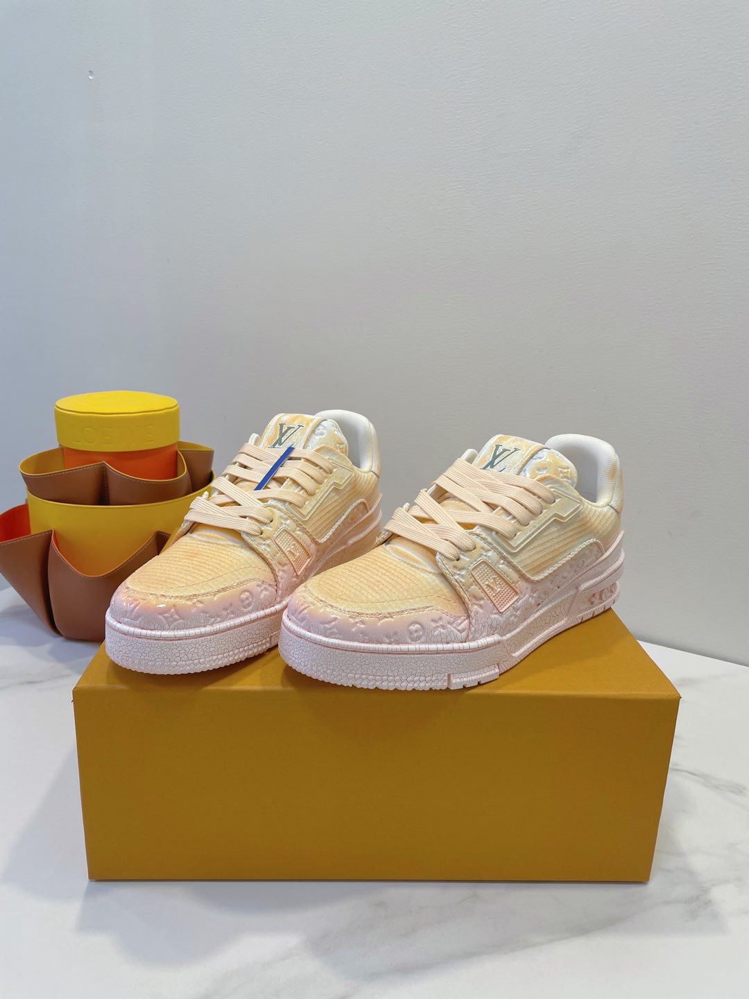 LOUIS VUITTON LV TRAINER MAXI SNEAKER IN LIGHT PINK OMBRE ORANGE EMBOSSED CALFSKIN