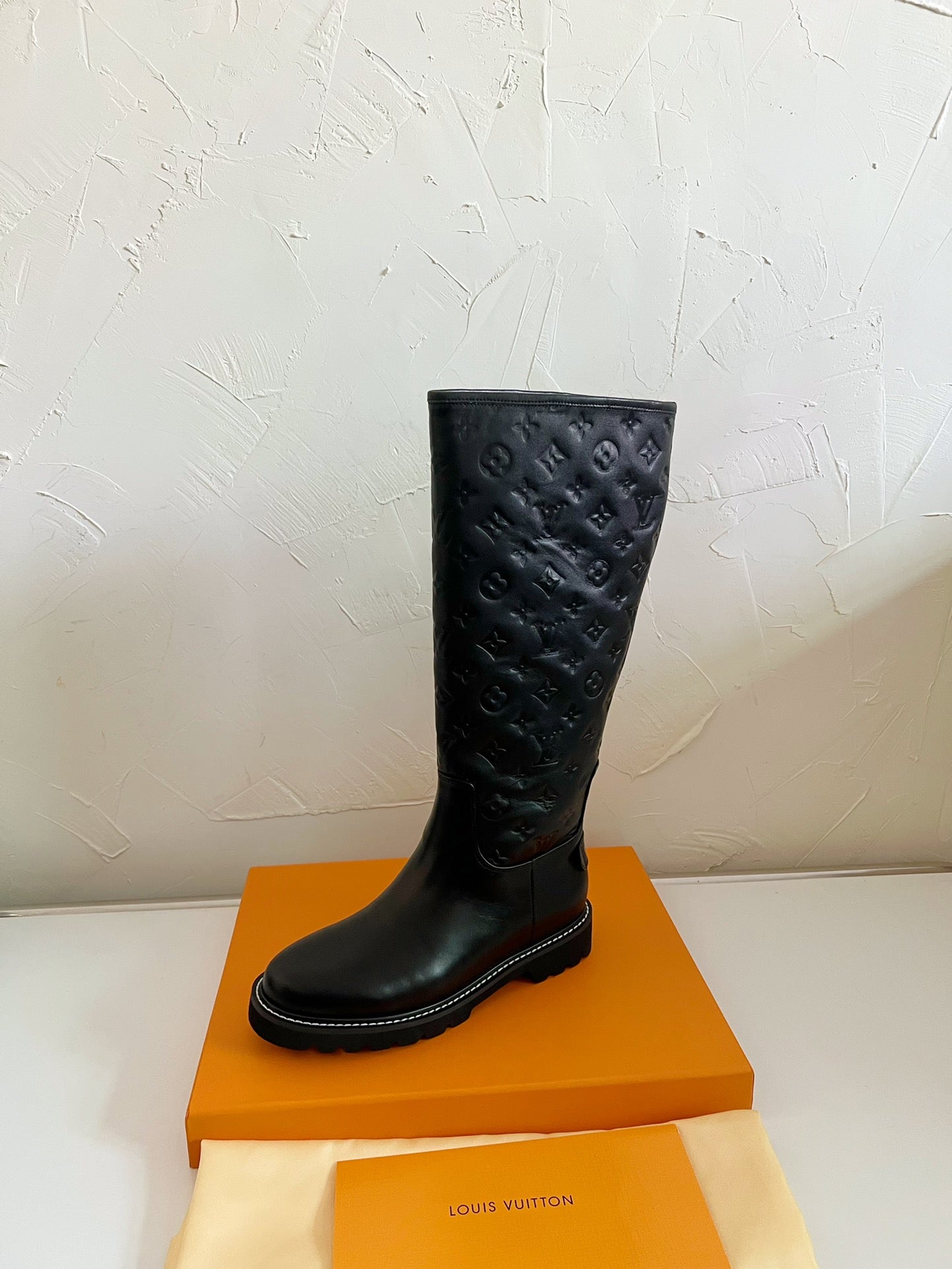 LOUIS VUITTON TERRITORY FLAT HIGH BOOT IN BLACK EMBOSSED CALFSKIN