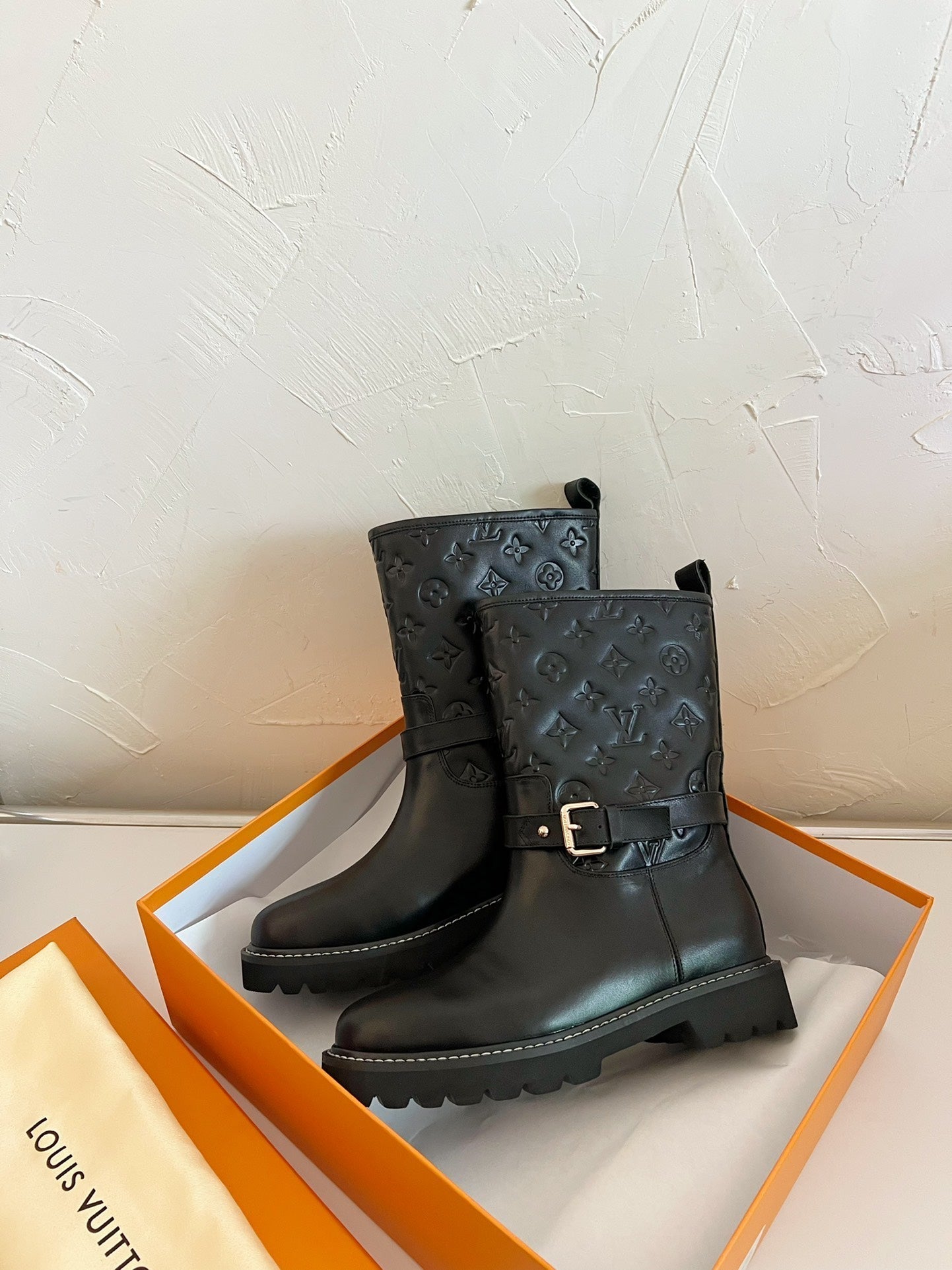 LOUIS VUITTON TERRITORY FLAT ANKLE BOOT IN BLACK EMBOSSED CALFSKIN