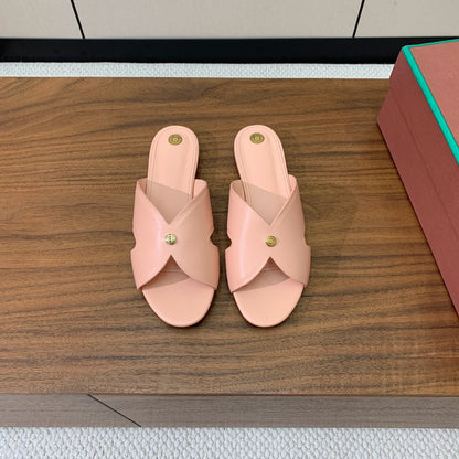 FLAT SLIPPERS IN LIGHT PINK CALFSKIN