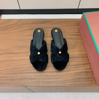 FLAT SLIPPERS IN BLACK SUEDE