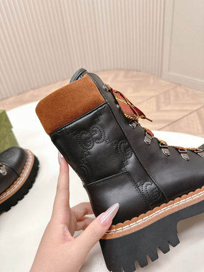 GUCCI MARTIN ANKLE BOOTS IN BLACK EMBOSSED CALFSKIN MIX BROWN SUEDE