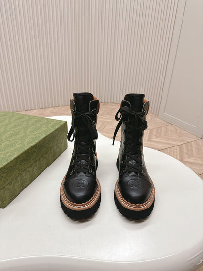 GUCCI MARTIN LACE-UP ANKLE BOOTS IN BLACK EMBOSSED CALFSKIN MIX BROWN SUEDE