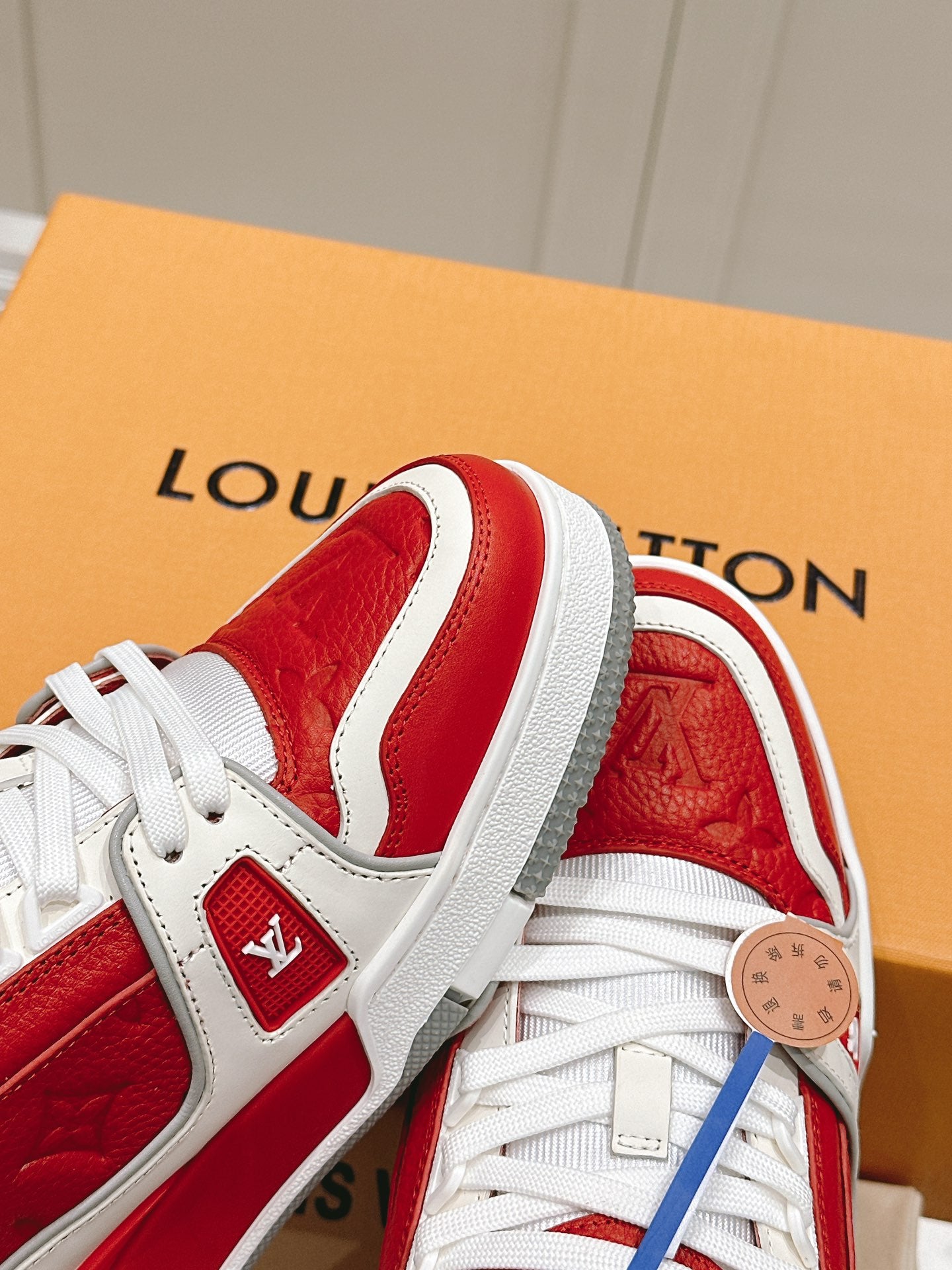 LOUIS VUITTON LV TRAINER SNEAKER IN SARI RED GRAINED CALFSKIN