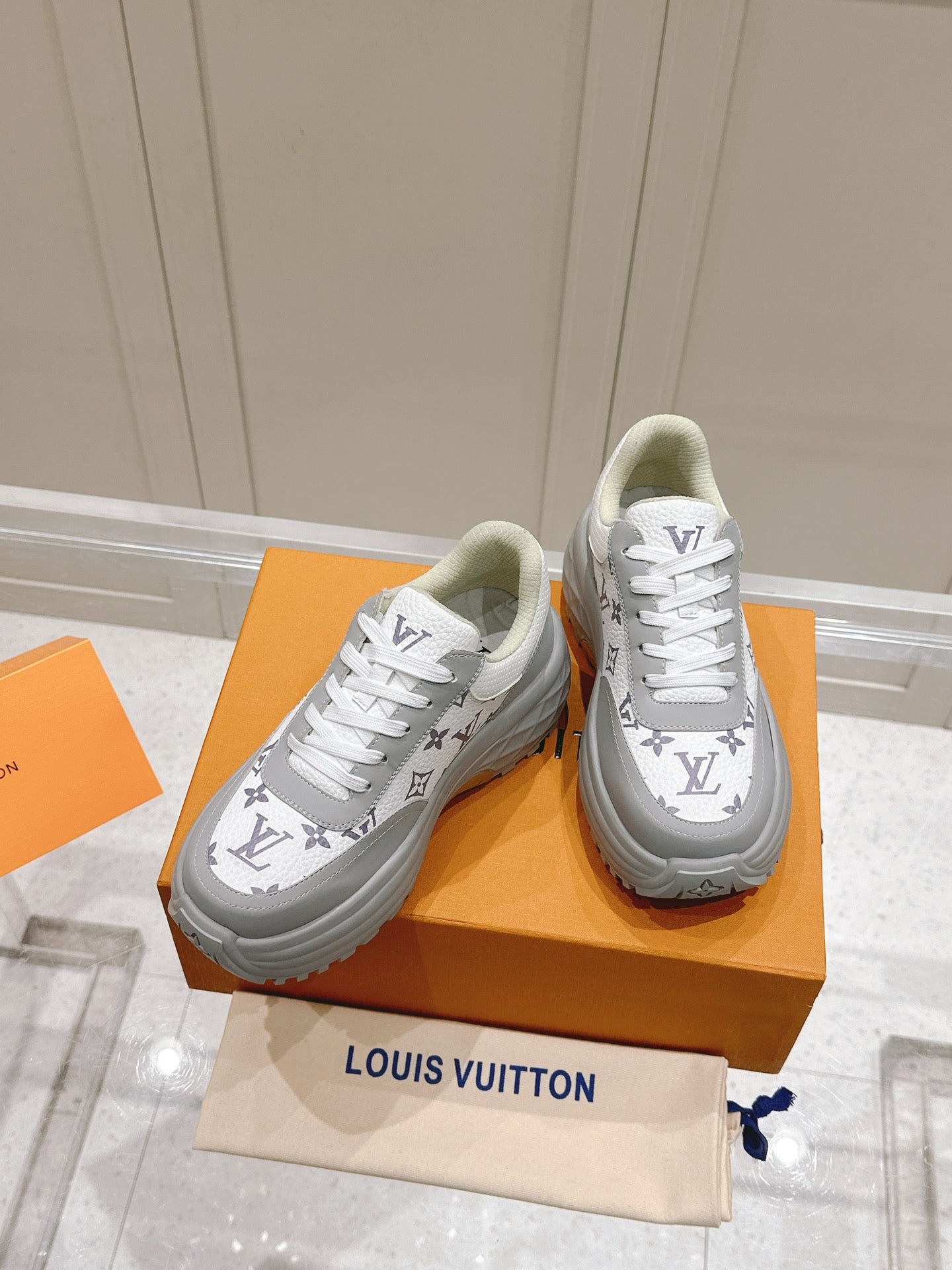 LOUIS VUITTON RUN AWAY SNEAKER IN DOVE GRAY MIX WHITE CALFSKIN