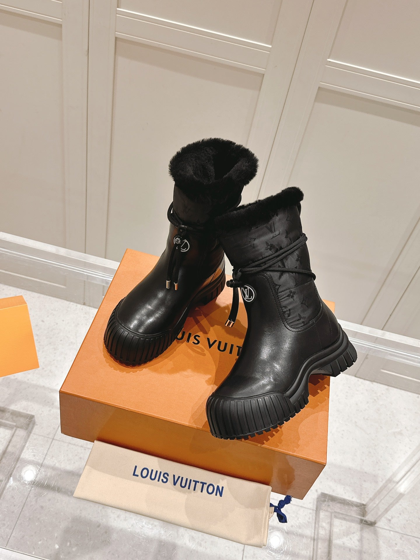 LOUIS VUITTON RUBY FLAT ANKLE BOOT IN BLACK CALFSKIN AND MONOGRAM NYLON