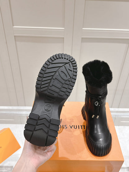 LOUIS VUITTON RUBY FLAT ANKLE BOOT IN BLACK CALFSKIN AND MONOGRAM NYLON