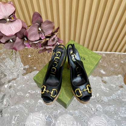 GUCCI SANDAL WITH PLATFORM AND CLAMP BLACK LAMBSKIN