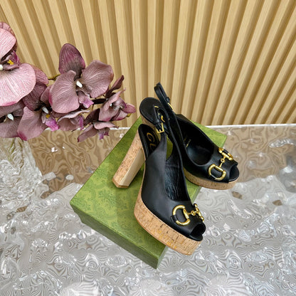 GUCCI SANDAL WITH PLATFORM AND CLAMP BLACK LAMBSKIN