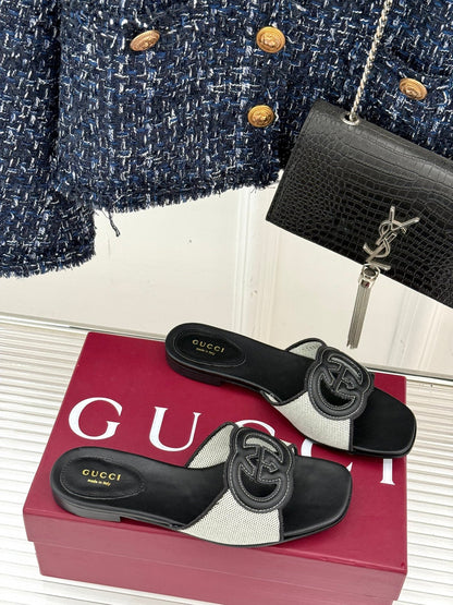 GUCCI SLIDE SANDALS IN BLACK AND WHITE CALFSKIN
