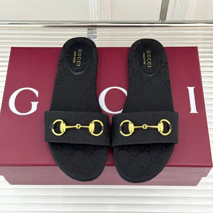 GUCCI SLIDE SANDALS IN BLACK FABRIC EMBOSSED LOGO