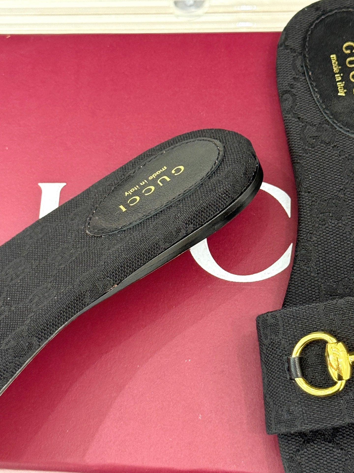 GUCCI SLIDE SANDALS IN BLACK FABRIC EMBOSSED LOGO