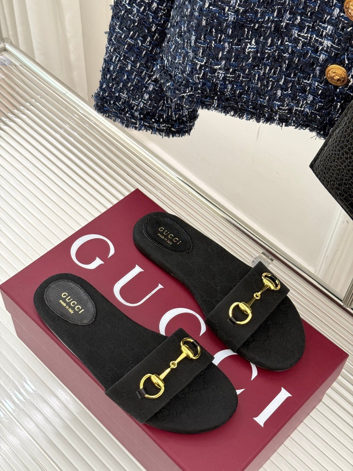 GUCCI SLIDE SANDALS IN BLACK FABRIC EMBOSSED LOGO