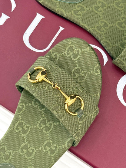 GUCCI SLIDE SANDALS IN MOSS GREEN FABRIC EMBOSSED LOGO