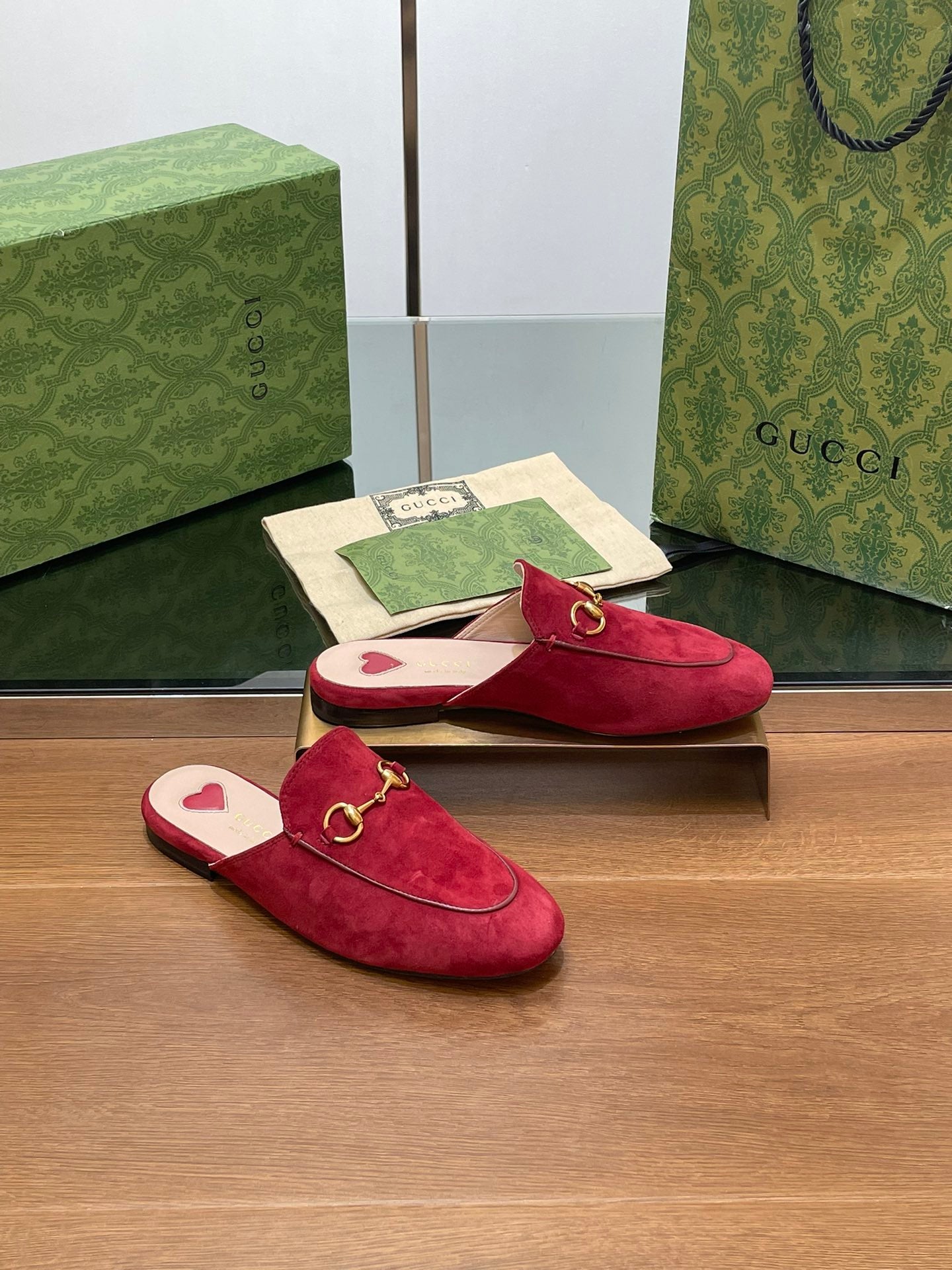 GUCCI HORSEBIT MULE IN CHERRY RED SUEDE WITH GOLD HARDWARE