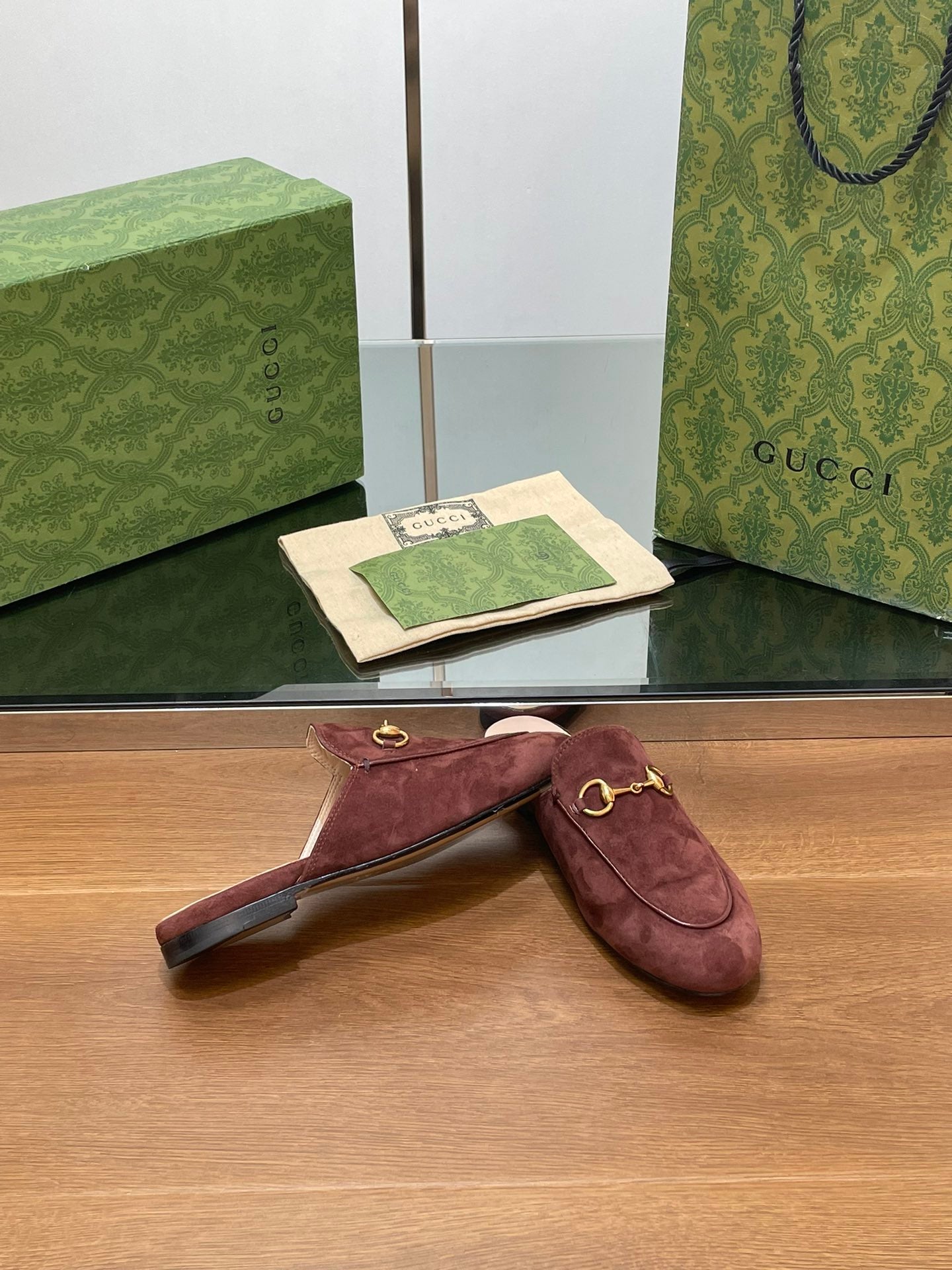 GUCCI HORSEBIT MULE IN UMBER BROWN SUEDE WITH GOLD HARDWARE