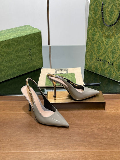 GUCCI HIGH SLINGBACK 10.5 CM IN DOVE GREY GLOSSY CALFSKIN WITH GOLD HARDWARE