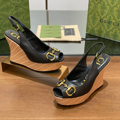 GUCCI WEDGE PLATFORM IN BLACK CALFSKIN WITH GOLD HARDWARE