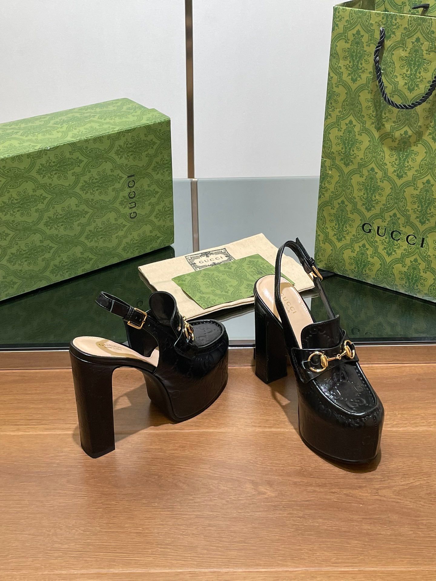GUCCI WOMEN'S HORSEBIT PLATFORM LOAFER SLINGBACK IN BLACK EMBOSSED CALFSKIN