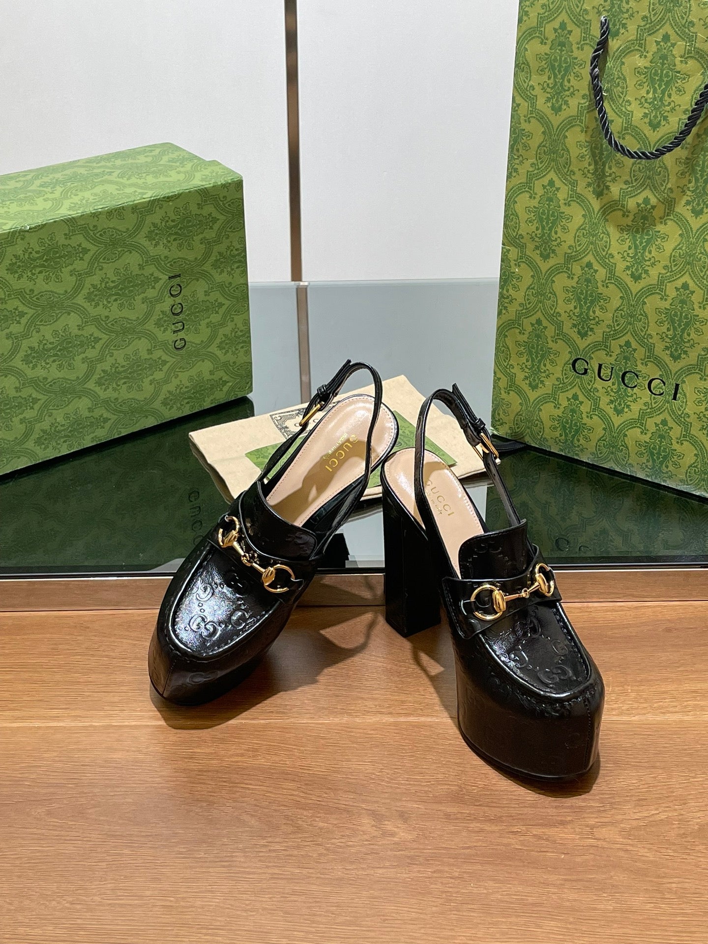 GUCCI WOMEN'S HORSEBIT PLATFORM LOAFER SLINGBACK IN BLACK EMBOSSED CALFSKIN