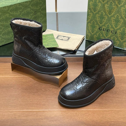 GUCCI U BOOTS IN BLACK EMBOSSED SUEDE AND BEIGE WOOL LINING