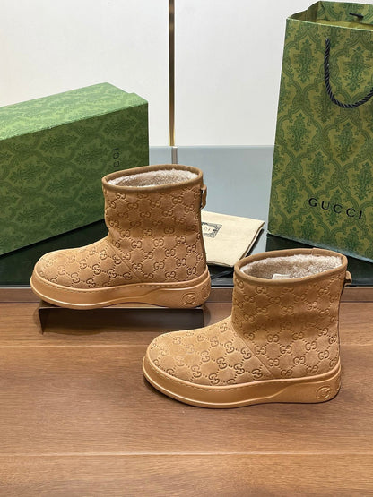 GUCCI U BOOTS IN CIDER BROWN EMBOSSED SUEDE AND BEIGE WOOL LINING