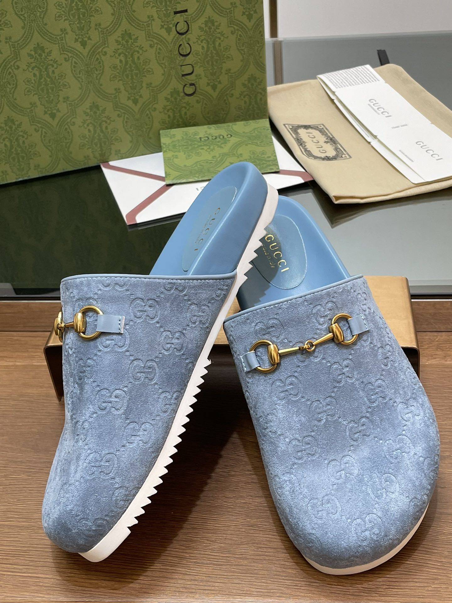 GUCCI HORSEBIT MULE IN LIGHT BLUE EMBOSSED SUEDE AND SHEEPSKIN LINING