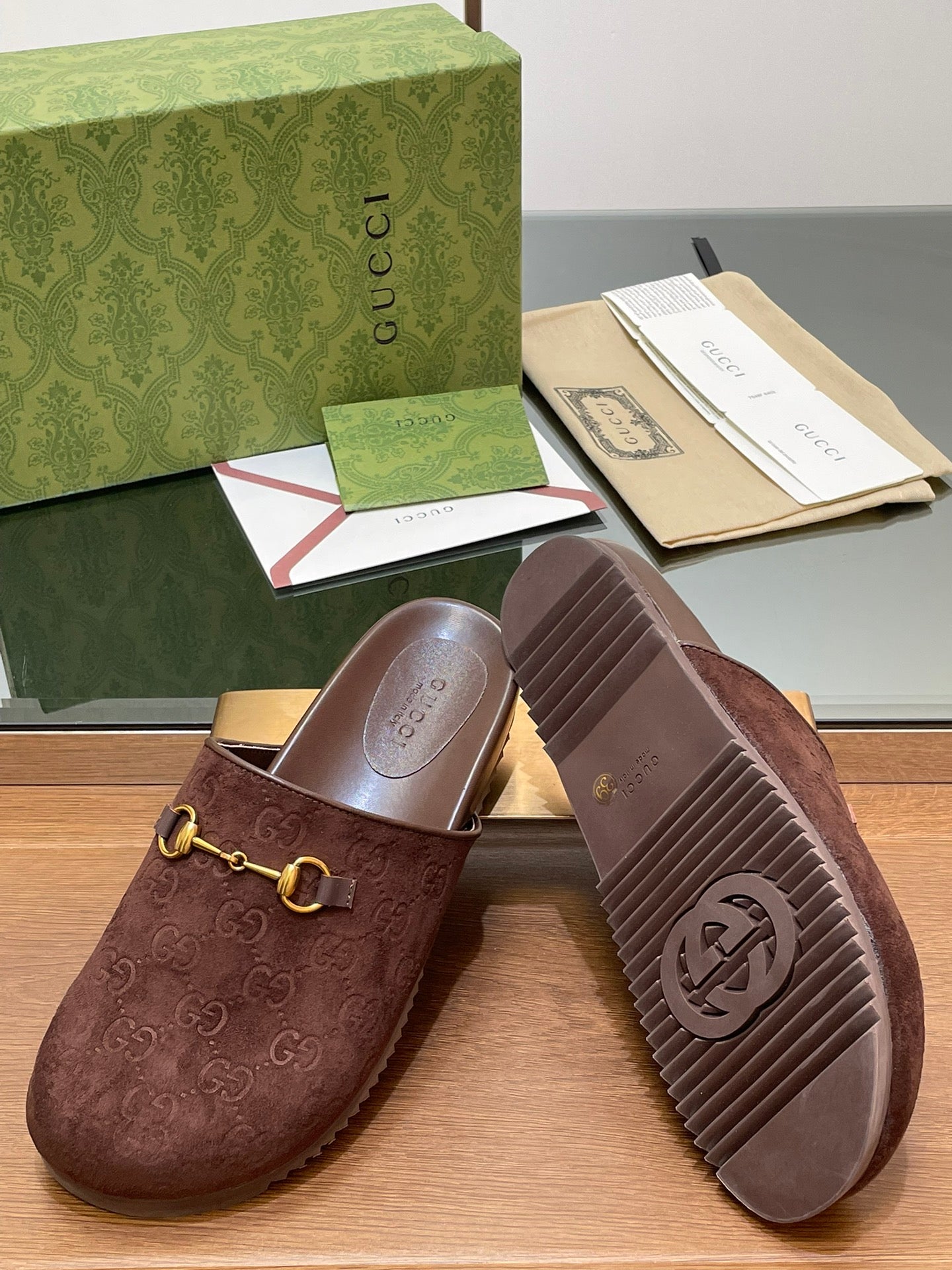 GUCCI HORSEBIT MULE IN CHOCOLATE BROWN EMBOSSED SUEDE AND SHEEPSKIN LINING