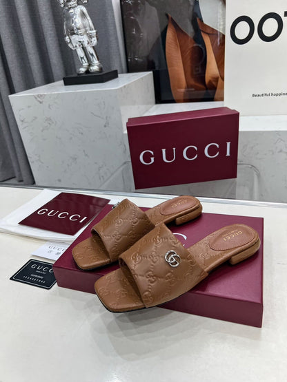 GUCCI CASUAL SLIPPERS IN BROWN CALFSKIN LOGO EMBOSSING