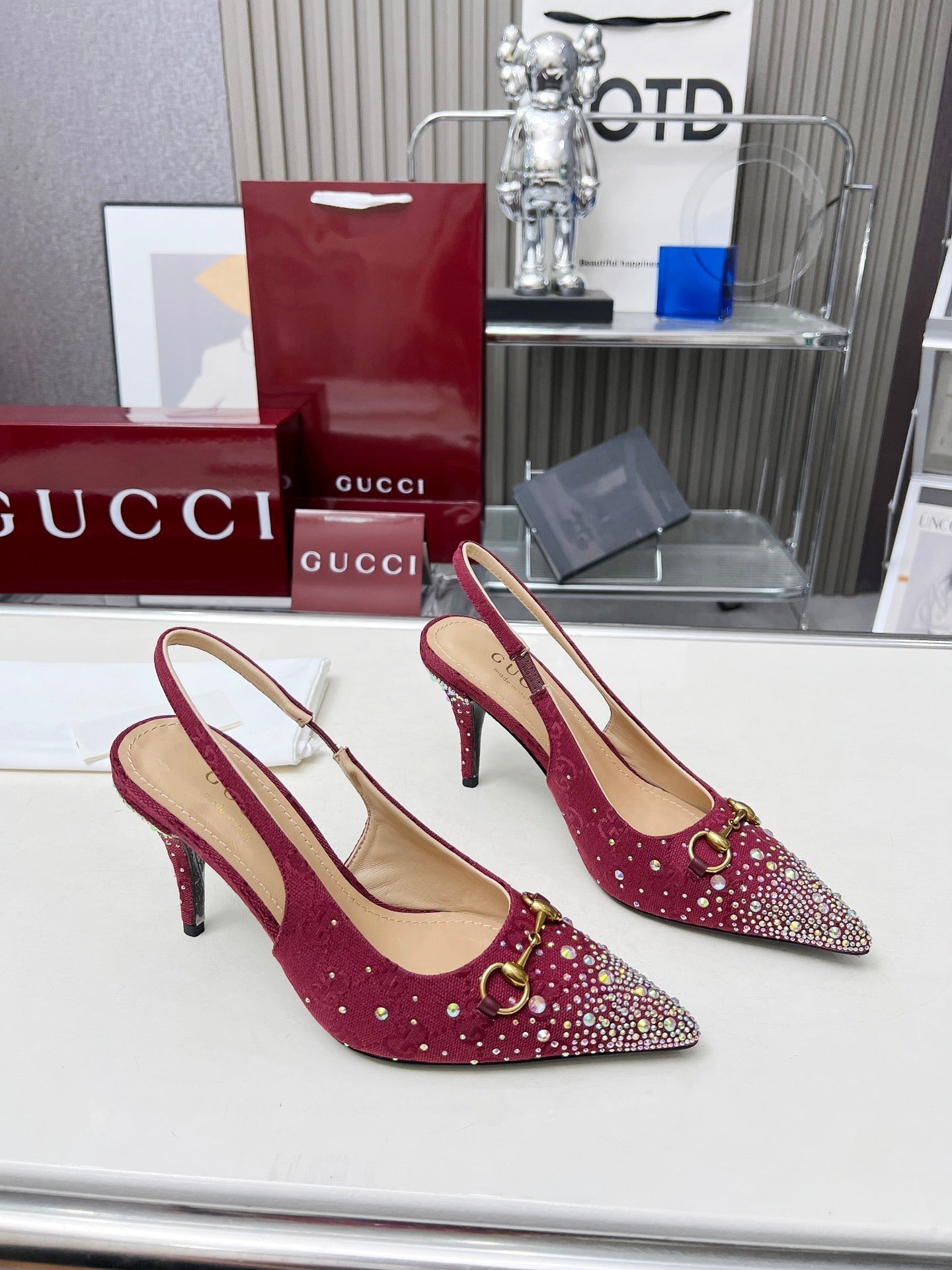 GUCCI HORSEBIT SLINGBACKS IN CHERRY RED MONOGRAM FABRIC WITH CRYSTALS