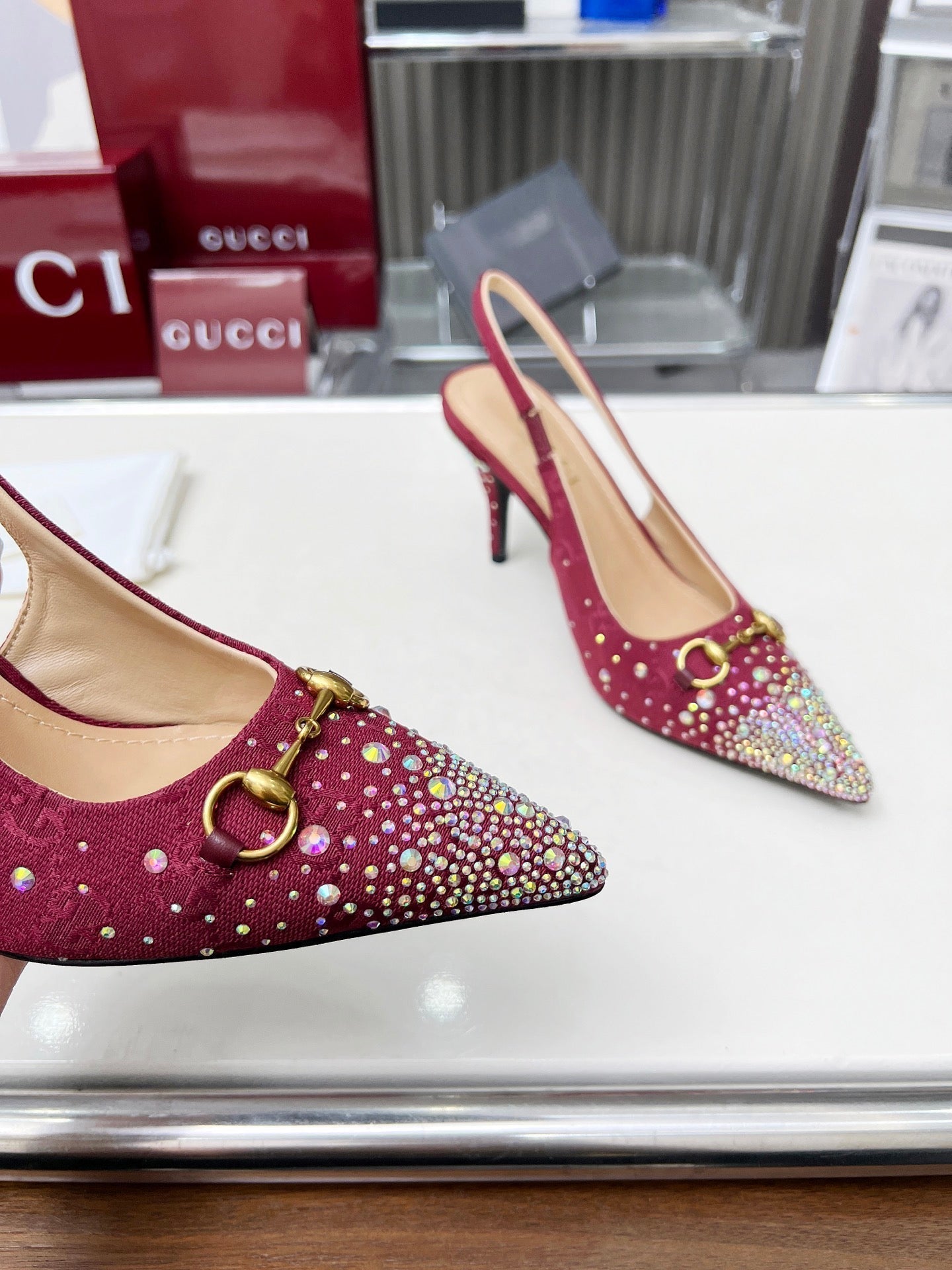 GUCCI HORSEBIT SLINGBACKS IN CHERRY RED MONOGRAM FABRIC WITH CRYSTALS