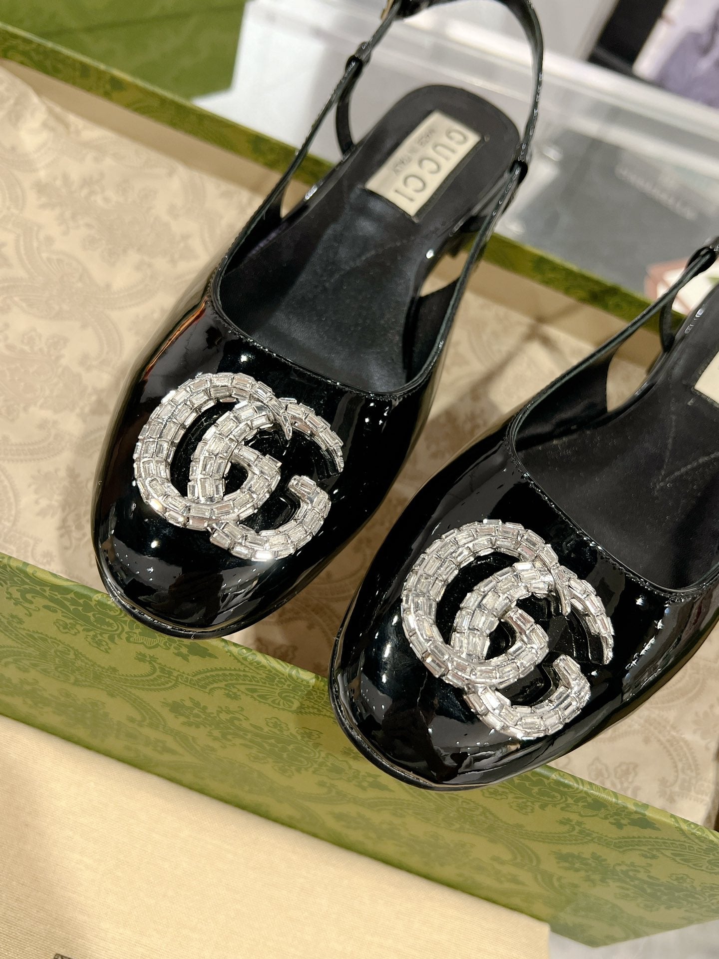 GUCCI METALIC SLINGBACK FLATS IN BLACK CALFSKIN