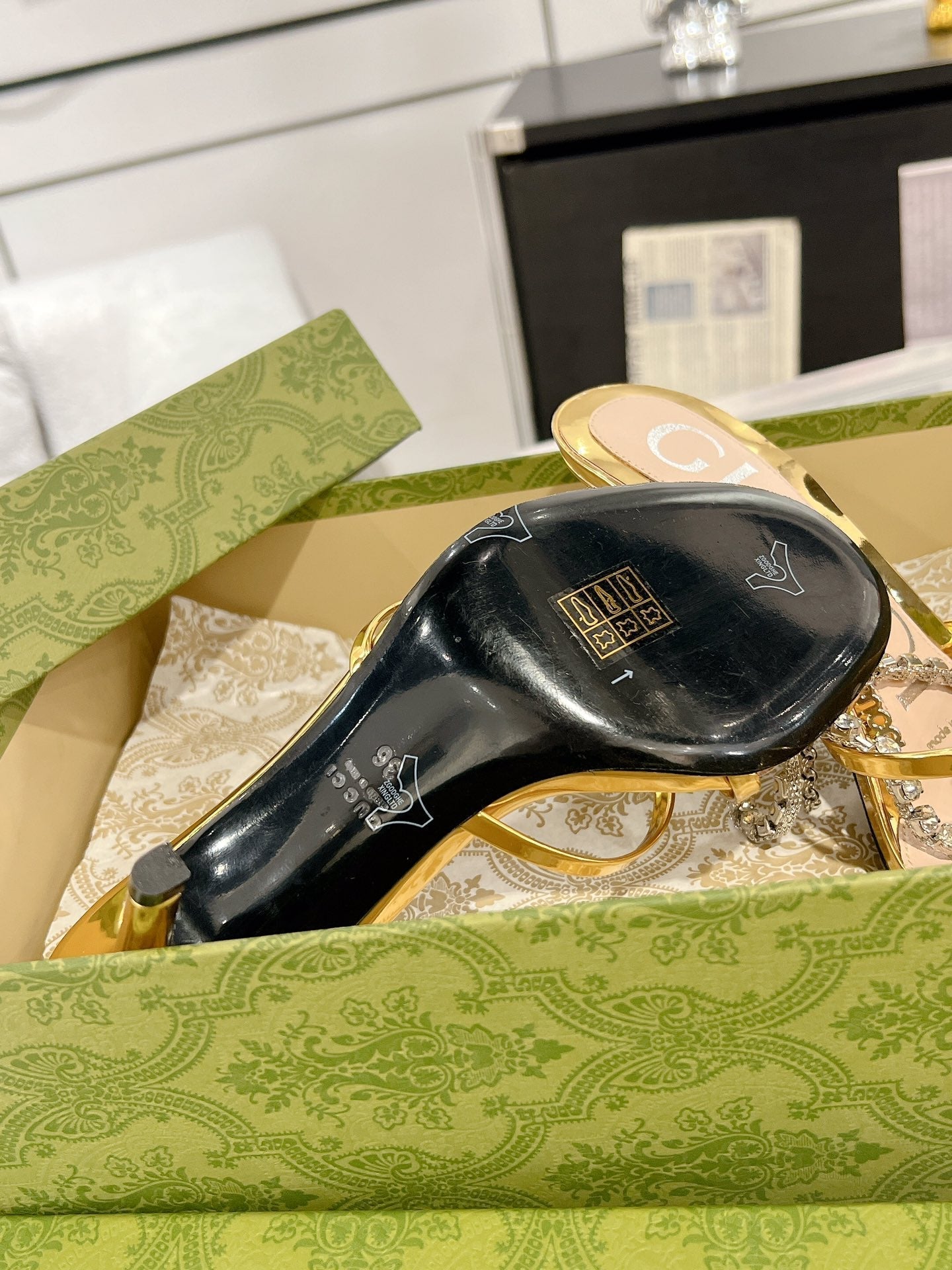 GUCCI STRAPPY SANDAL WITH RHINESTONE CHAIN IN GOLD PATENT LEATHER