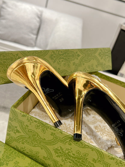 GUCCI STRAPPY SANDAL WITH RHINESTONE CHAIN IN GOLD PATENT LEATHER