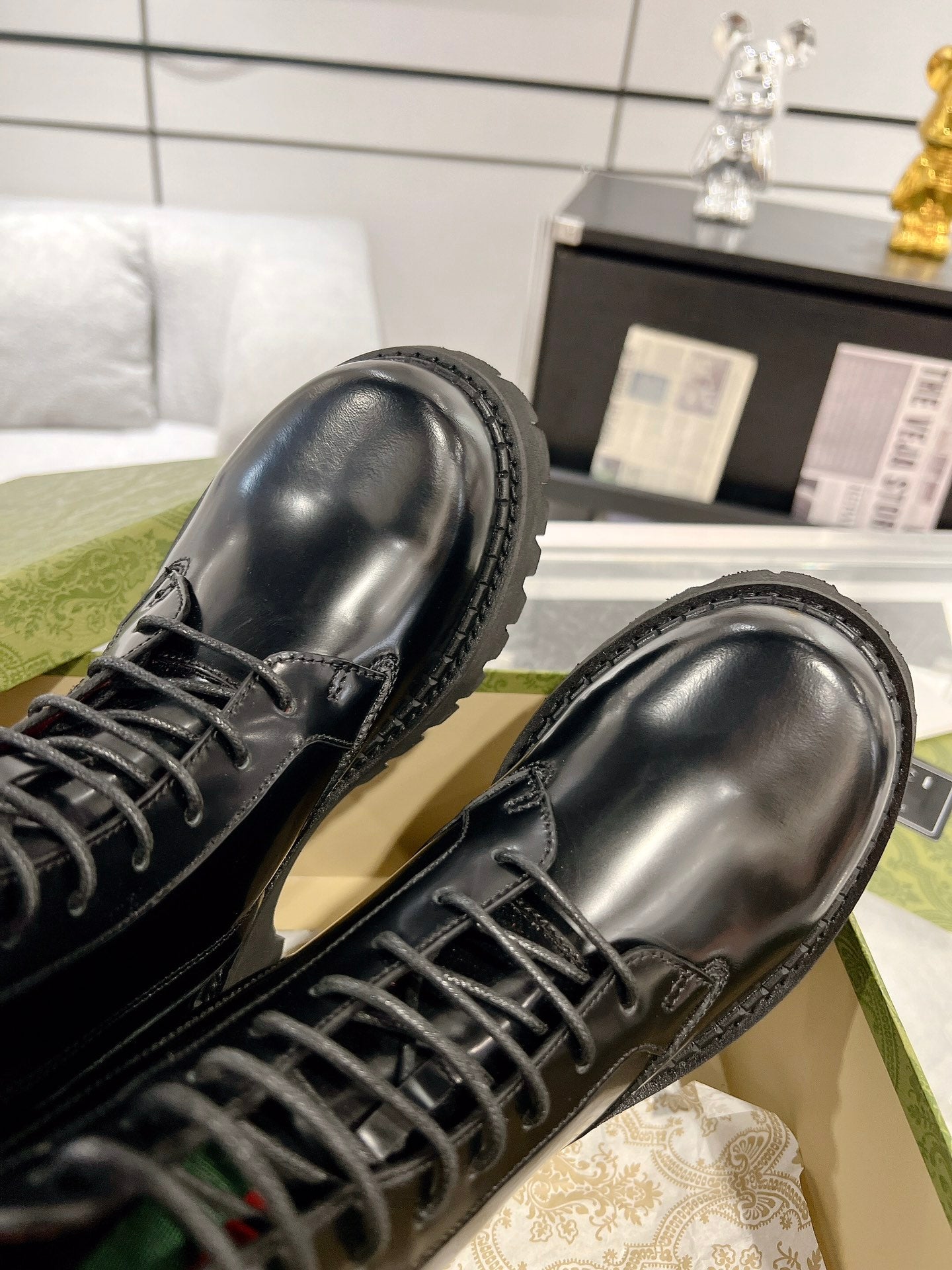 GUCCI WEB ANKLE BOOTS IN BLACK CALFSKIN