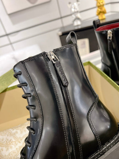 GUCCI WEB ANKLE BOOTS IN BLACK CALFSKIN