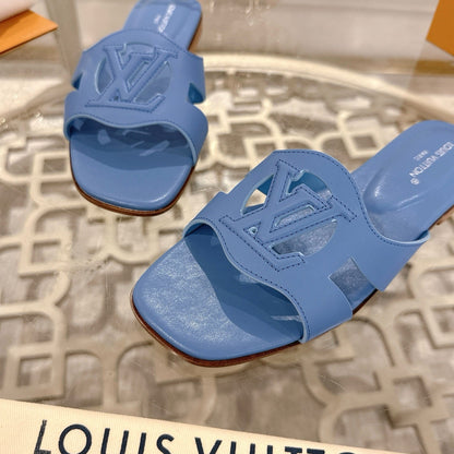 LOUIS VUITTON ISOLA FLAT SLIDE IN CORNFLOWER BLUE CALFSKIN