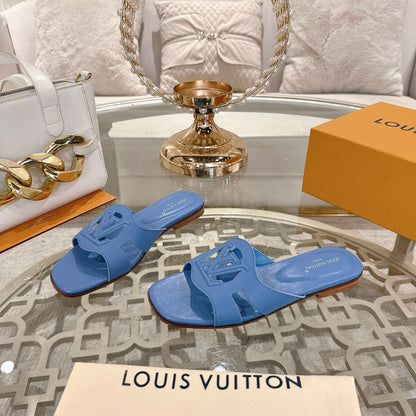 LOUIS VUITTON ISOLA FLAT SLIDE IN CORNFLOWER BLUE CALFSKIN