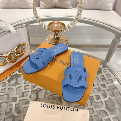LOUIS VUITTON ISOLA FLAT SLIDE IN CORNFLOWER BLUE CALFSKIN