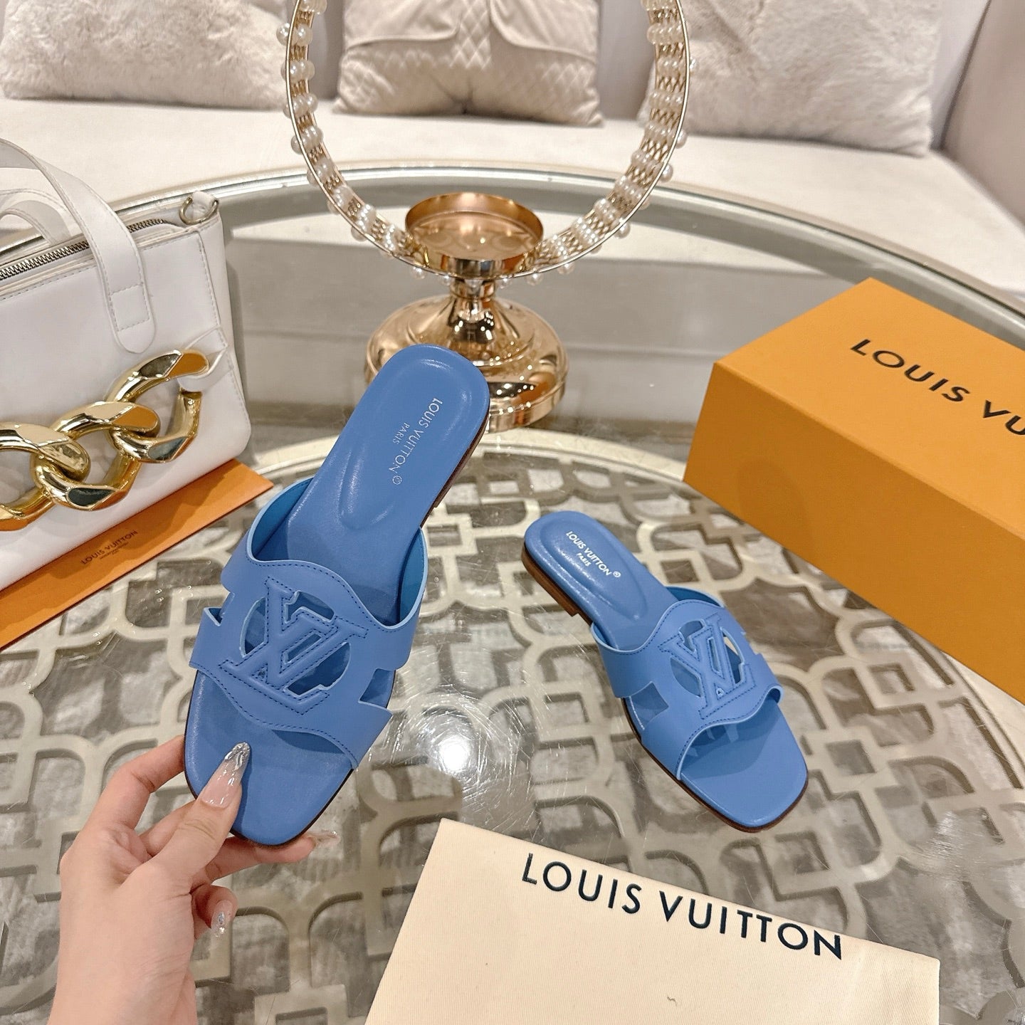 LOUIS VUITTON ISOLA FLAT SLIDE IN CORNFLOWER BLUE CALFSKIN