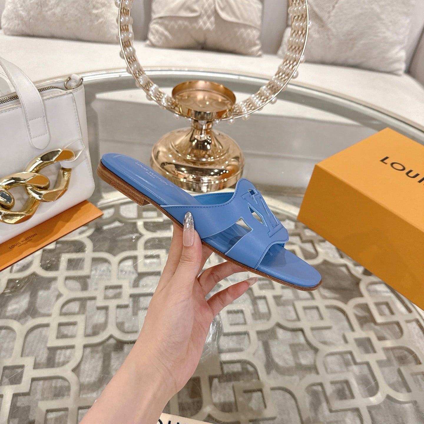 LOUIS VUITTON ISOLA FLAT SLIDE IN CORNFLOWER BLUE CALFSKIN