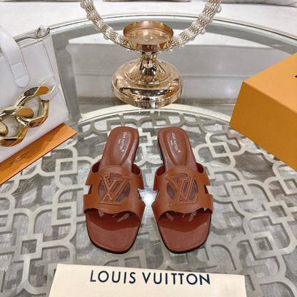 LOUIS VUITTON ISOLA FLAT SLIDE IN PENNY BROWN CALFSKIN