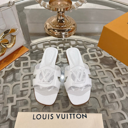 LOUIS VUITTON ISOLA FLAT SLIDE IN WHITE CALFSKIN