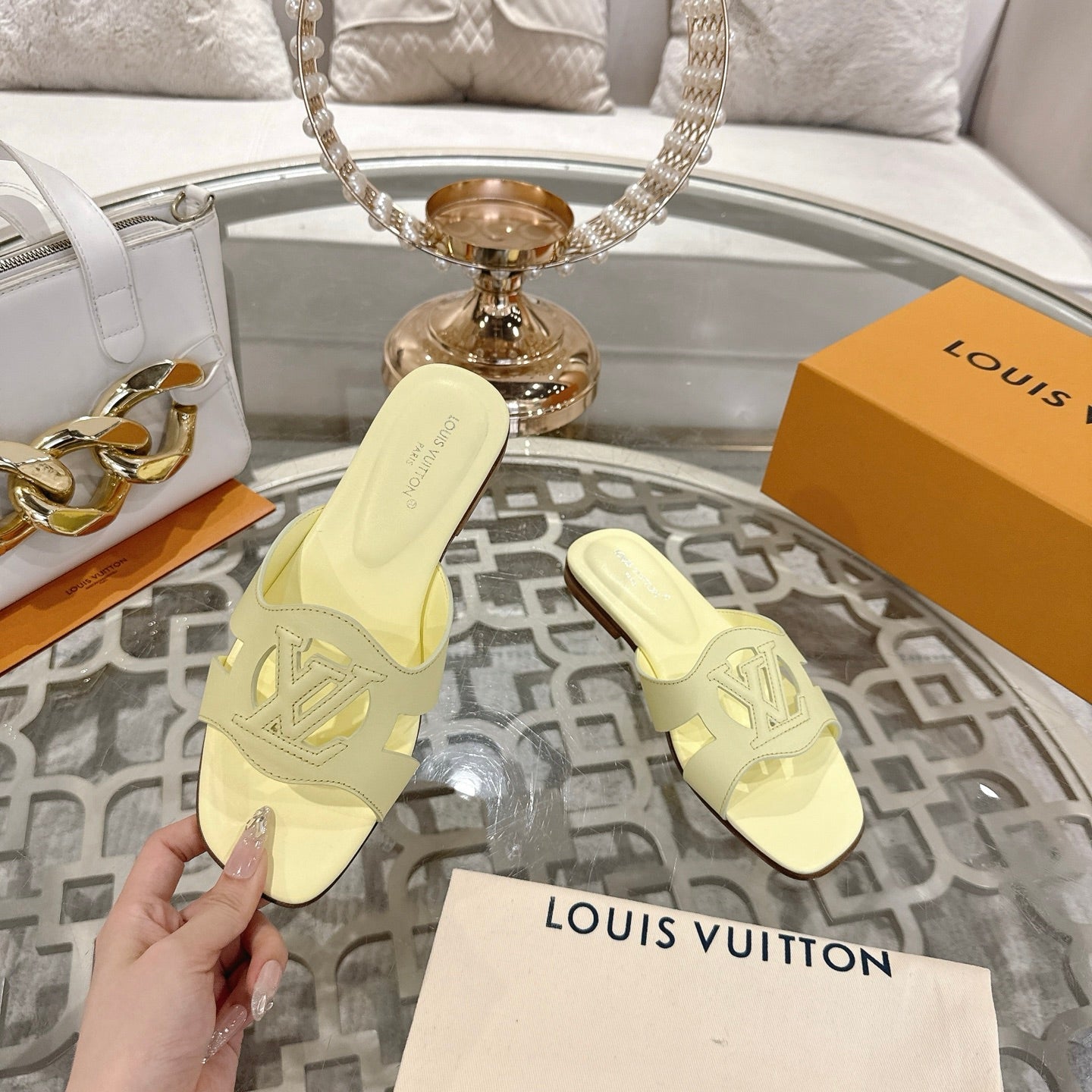 LOUIS VUITTON ISOLA FLAT SLIDE IN PALE YELLOW CALFSKIN