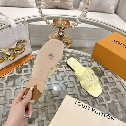 LOUIS VUITTON ISOLA FLAT SLIDE IN PALE YELLOW CALFSKIN